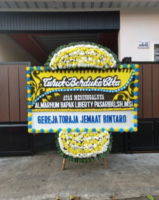 Papan Bunga Duka di Anggut Atas